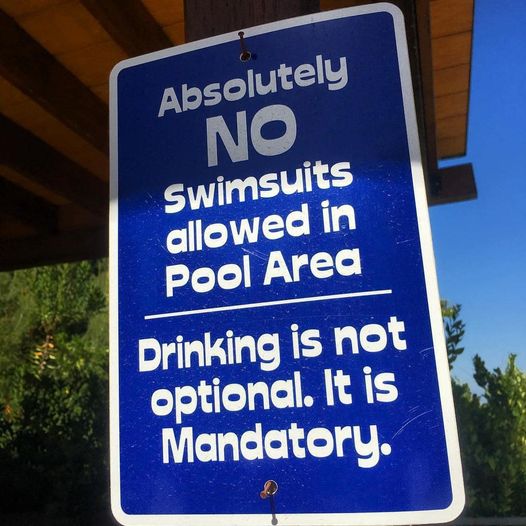 absolutely no swimsuits allowed in the pool area.jpg