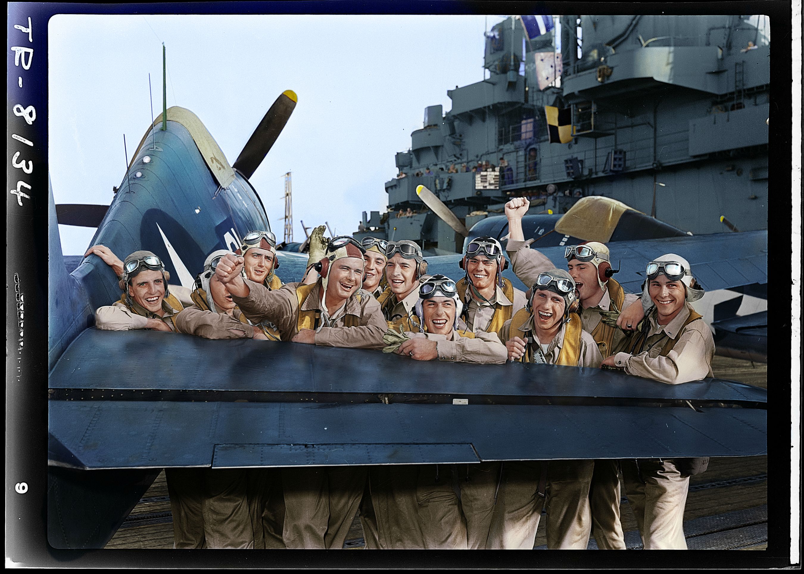 Fighting Squadron Sixteen (VF-16) F6F Hellcat pilots on board the USS Lexington (CV 16) celebrate after shooting down 17 of 20 Japanese off Tarawa.jpg