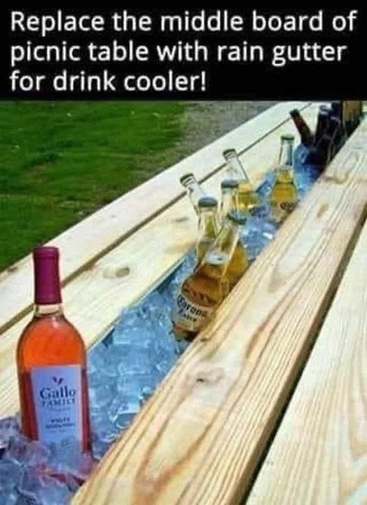 replace the middle board of an outdoor table with a rain gutter for a beverage cooler.jpg