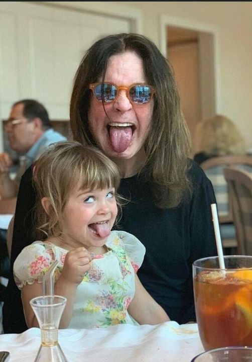 Ozzy Osbourne with his grand-daughter.jpg