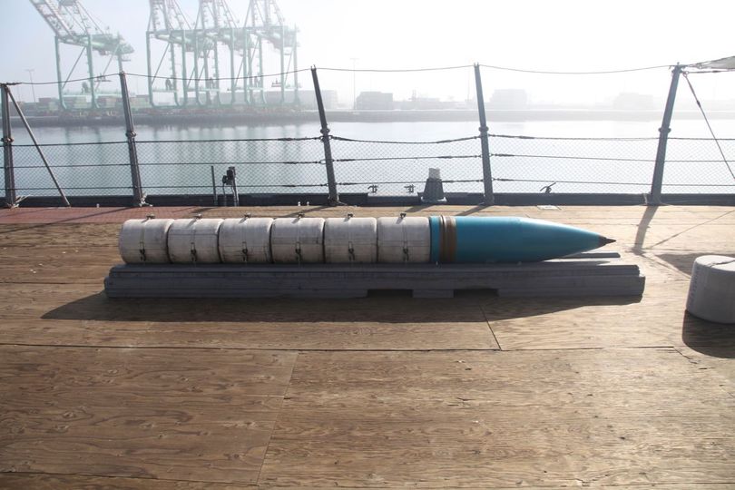One of the 16 inch gun projectiles plus six propellant bags Display mockup aboard USS Iowa.jpg
