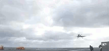 navy trainer landing on carrier.gif