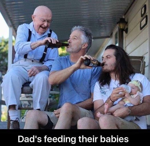 dads feeding the babies.jpg