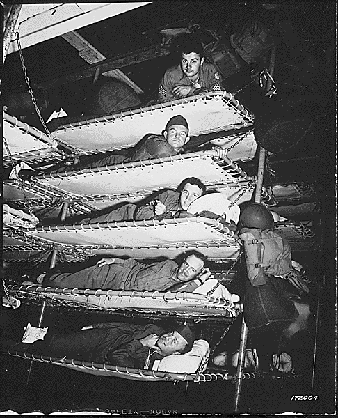 us soldiers aboard troop ship prior to invasion of lae.gif